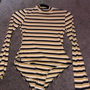 stripped (yellow black and white) body suit